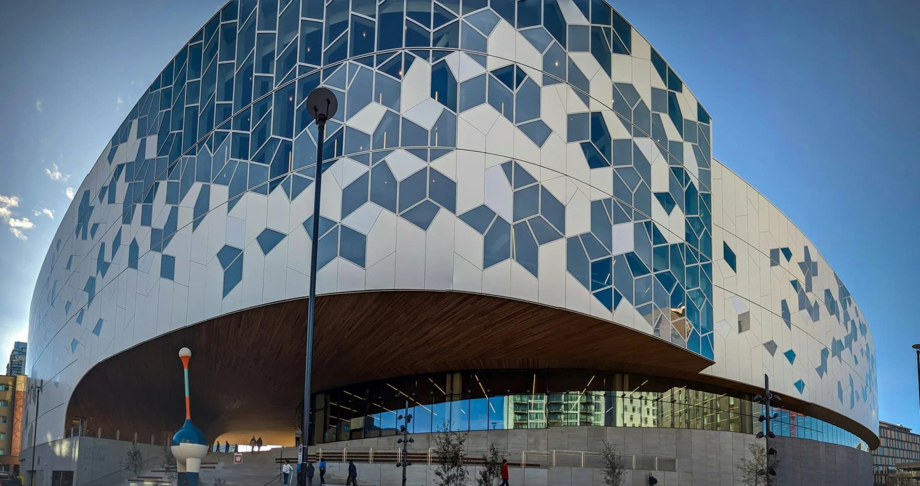 A modern Calgary building with a patterned facade